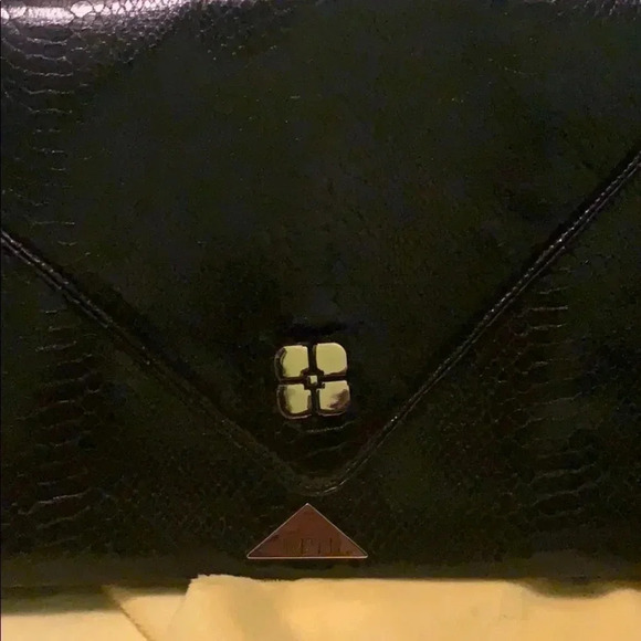 IMAN CLUTCH - Picture 7 of 8